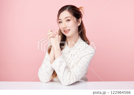 Beautiful young asian woman with clean fresh skin on pink background, Face care, Facial treatment, Cosmetology, beauty and spa, Asian women portrait. 122964566