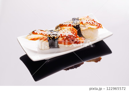 Sushi beautifully arranged on plate 122965572