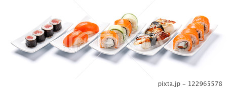 Assorted sushi and maki rolls beautifully arranged on plates Assorted sushi and maki rolls beautifully arranged on plates 122965578
