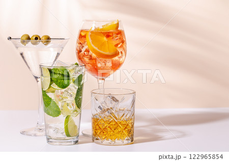 A vibrant display of cocktails, including Aperol Spritz, Mojito, and Martini 122965854