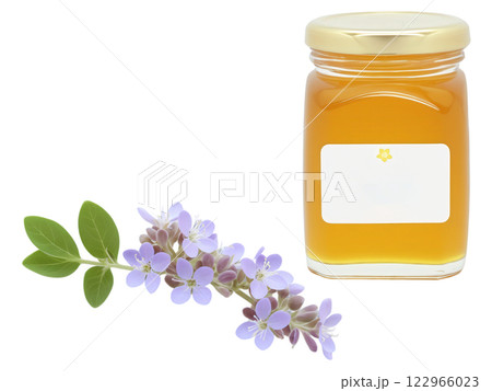Marjoram Blossom Honey (Origanum majorana) Light amber honey with a mild herbal flavor, displayed in a transparent jar next 122966023