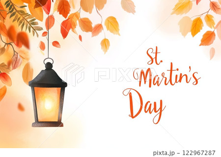 An autumn themed image for St. Martins Day, featuring a glowing lantern hanging from a branch 122967287