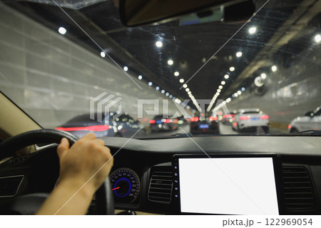 People driving car in tunnel People driving car in tunnel 122969054