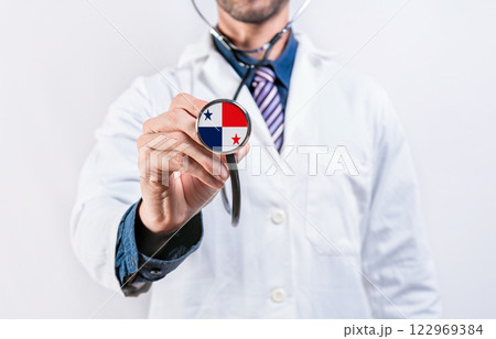 Panama Healthcare System, doctor holding stethoscope. Panama health and medical insurance concept Panama Healthcare System, doctor holding stethoscope. Panama health and medical insurance concept 122969384