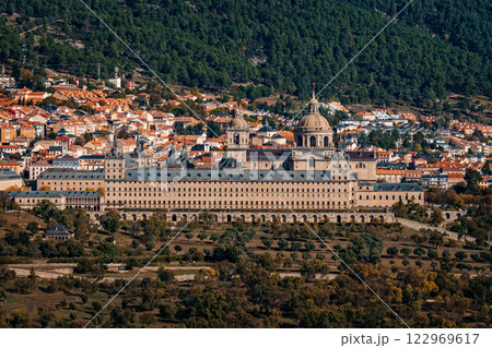 Majestic Royal Monastery of El Escorial stands proudly amidst the scenic Spanish landscape. 122969617