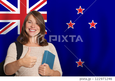 Successful woman student against New Zealand flag background. Successful woman student against New Zealand flag background. 122971246