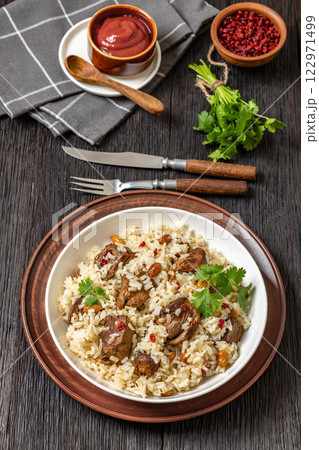 beef and rice in white bowl, top view beef and rice in white bowl, top view 122971499
