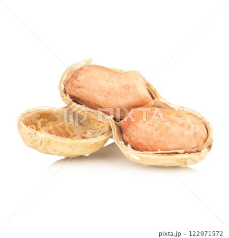 Peanuts isolated on white background Peanuts isolated on white background 122971572