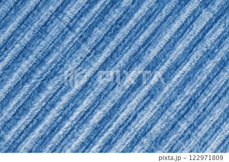 Ridge fluffy macro texture corduroy blue cloth. Large ribbed, diagonal weaving fabric background 122971809