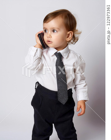 Baby Businessman, Cute Kid on Phone, Business Baby Photo, Serious Baby Talk, Funny Business Image, Baby CEO, Tiny Tycoon, Child Entrepreneur, Future Leader, Smart Baby Portrait 122973361
