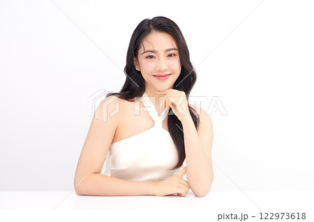 Beautiful young asian woman with clean fresh skin on white background, Face care, Facial treatment, Cosmetology, beauty and spa, Asian women portrait. Beautiful young asian woman with clean fresh skin on white background, Face care, Facial treatment, Cosmetology, beauty and spa, Asian women portrait. 122973618