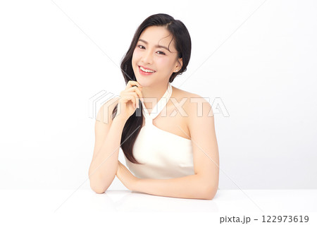 Beautiful young asian woman with clean fresh skin on white background, Face care, Facial treatment, Cosmetology, beauty and spa, Asian women portrait. Beautiful young asian woman with clean fresh skin on white background, Face care, Facial treatment, Cosmetology, beauty and spa, Asian women portrait. 122973619