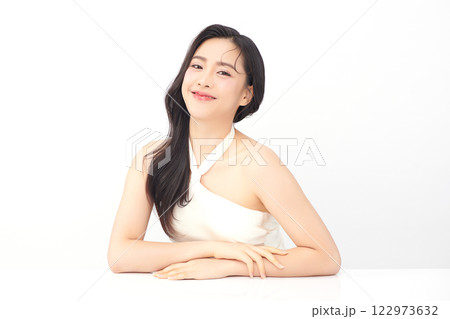 Beautiful young asian woman with clean fresh skin on white background, Face care, Facial treatment, Cosmetology, beauty and spa, Asian women portrait. Beautiful young asian woman with clean fresh skin on white background, Face care, Facial treatment, Cosmetology, beauty and spa, Asian women portrait. 122973632