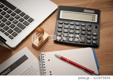 Business and accountant concept with calculator 122973850
