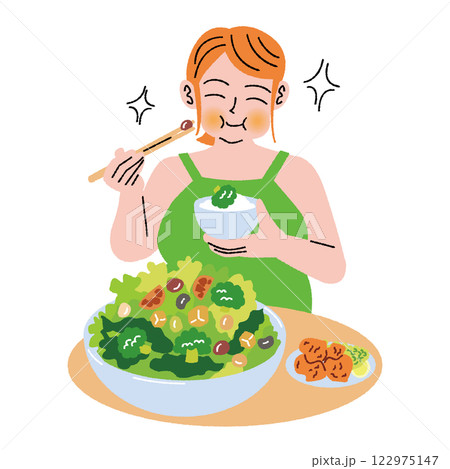 肥満の女性が美味しそうにサラダを食べる 122975147