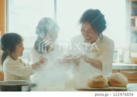 Three generations of a family baking together 122978856