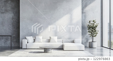 Modern minimalist living room with white sofa, concrete coffee table, and potted plant in a bright open space. 122978863