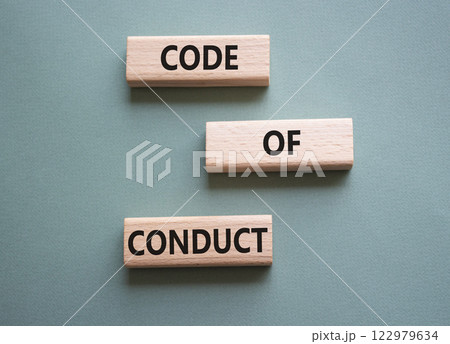 Code of conduct symbol. Wooden blocks with words Code of conduct. Beautiful grey green background. Business and Code of conduct concept. Copy space. Code of conduct symbol. Wooden blocks with words Code of conduct. Beautiful grey green background. Business and Code of conduct concept. Copy space. 122979634