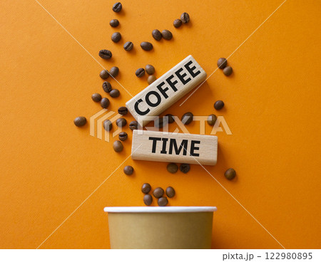 Coffee Time symbol. Concept word Coffee Time on wooden blocks. Beautiful orange background with coffee cup. Business and Coffee Time concept. Copy space Coffee Time symbol. Concept word Coffee Time on wooden blocks. Beautiful orange background with coffee cup. Business and Coffee Time concept. Copy space 122980895