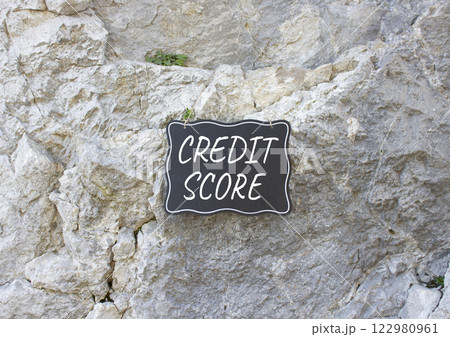 Credit Score symbol. Stone wall with words Credit Score. Beautiful stone background. Business and Credit Score concept. Copy space. Credit Score symbol. Stone wall with words Credit Score. Beautiful stone background. Business and Credit Score concept. Copy space. 122980961