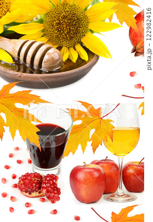 Honey, pomegranate fruit and apples isolated on white background. Collage. Vertical photo. Honey, pomegranate fruit and apples isolated on white background. Collage. Vertical photo. 122982416