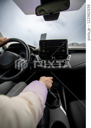 A Contemporary Vehicle Interior Featuring the Drivers Viewpoint and Infotainment Technology A Contemporary Vehicle Interior Featuring the Drivers Viewpoint and Infotainment Technology 122982836