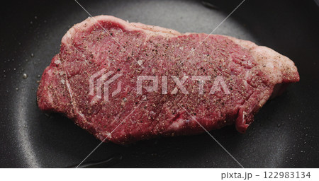 new york steak on nonstick pan new york steak on nonstick pan 122983134