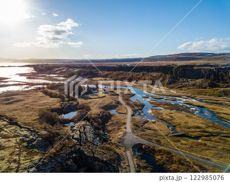Aerial views reveal the breathtaking scenery of Tingvellir national park in Iceland, showcasing its remarkable natural beauty and unique geological features Aerial views reveal the breathtaking scenery of Tingvellir national park in Iceland, showcasing its remarkable natural beauty and unique geological features 122985076