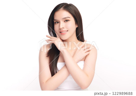 Beautiful young asian woman with clean fresh skin on white background, Face care, Facial treatment, Cosmetology, beauty and spa, Asian women portrait. Beautiful young asian woman with clean fresh skin on white background, Face care, Facial treatment, Cosmetology, beauty and spa, Asian women portrait. 122989688