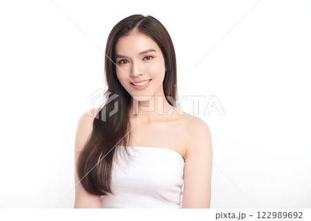 Beautiful young asian woman with clean fresh skin on white background, Face care, Facial treatment, Cosmetology, beauty and spa, Asian women portrait. Beautiful young asian woman with clean fresh skin on white background, Face care, Facial treatment, Cosmetology, beauty and spa, Asian women portrait. 122989692