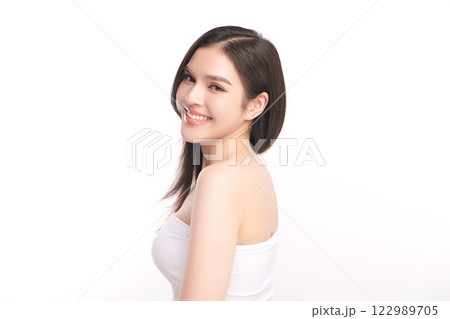 Beautiful young asian woman with clean fresh skin on white background, Face care, Facial treatment, Cosmetology, beauty and spa, Asian women portrait. Beautiful young asian woman with clean fresh skin on white background, Face care, Facial treatment, Cosmetology, beauty and spa, Asian women portrait. 122989705