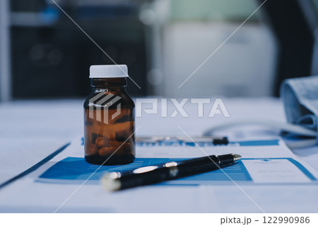 stethoscope on a report stethoscope on a clipboard stethoscope on a book stethoscope on a report stethoscope on a clipboard stethoscope on a book 122990986