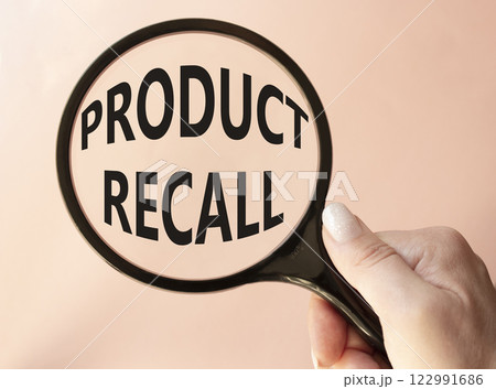 Product recall symbol. Concept words Product recall on magnifying glass. Beautiful pink background. Businessman hand. Business and Product recall concept. Copy space. Product recall symbol. Concept words Product recall on magnifying glass. Beautiful pink background. Businessman hand. Business and Product recall concept. Copy space. 122991686