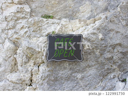 Cafe Open symbol. Stone wall with words Cafe Open. Beautiful stone background. Business and Cafe Open concept. Copy space. 122991730