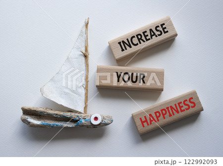 Increase your Happiness symbol. Concept words Increase your Happiness on wooden blocks. Beautiful white background with boat. Business and Increase your Happiness concept. Copy space 122992093