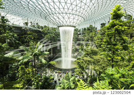 View of HSBC Rain Vortex at Jewel Changi Airport, Singapore, is the world's largest and tallest indoor artificial waterfall and surrounded by a terraced forest setting. 123002504