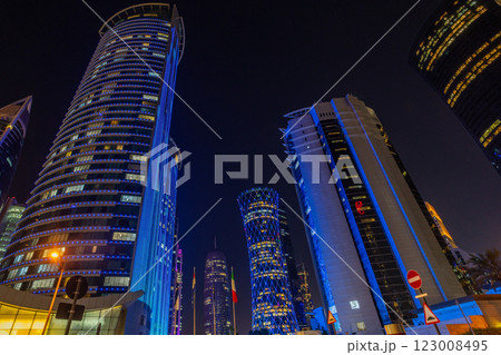 Doha city business downtown center illuminated at night, with modern skyscrapers, Qatar 123008495