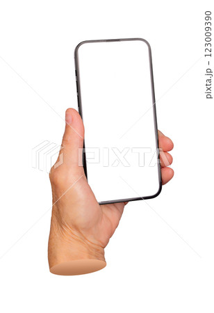 Elderly female hand holding a smartphone with a blank screen, fingers wrapped around the device. 123009390