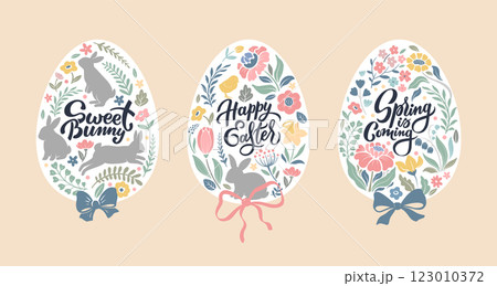 Vector set of Easter eggs with floral patterns, rabbits in beautiful pastel colors with hand lettering. 123010372