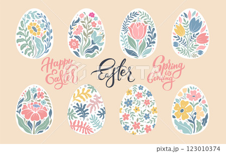 Vector set of Easter eggs with floral patterns in beautiful pastel colors with hand lettering. 123010374