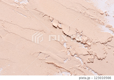 The texture of dry cosmetic clay for masks or cosmetic powder. The texture of dry cosmetic clay for masks or cosmetic powder. 123010566