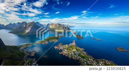 Amazing landscape of the Lofoten Islands from the top of Reinebringen Mountain with blue sky , county of Nordland, Norway. Amazing landscape of the Lofoten Islands from the top of Reinebringen Mountain with blue sky , county of Nordland, Norway. 123010825