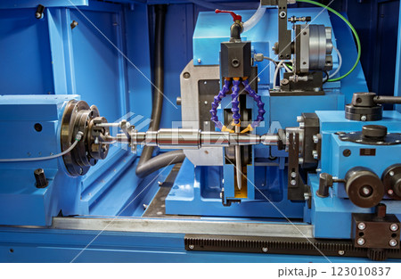 Metalworking CNC lathe milling machine. Cutting metal modern processing technology. 123010837