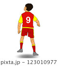 A soccer player in a red and yellow uniform. A soccer player in a red and yellow uniform. 123010977