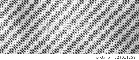 Grey textured background with a subtle halftone effect 123011258