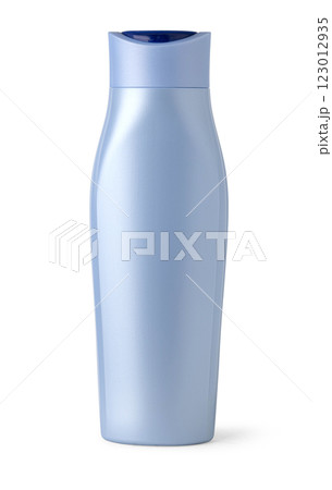 Light blue plastic cosmetic bottle standing on white background 123012935