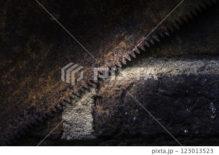 Close-up view of rusty handsaw teeth Close-up view of rusty handsaw teeth 123013523