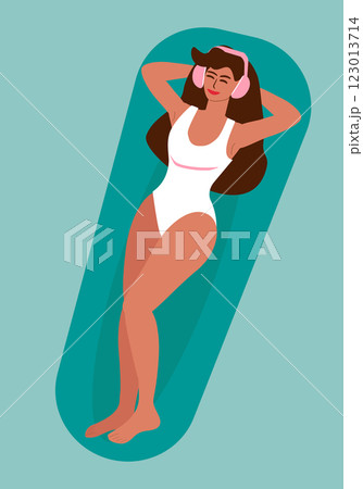 Young tanned woman in swimsuit listening to music in pool Young tanned woman in swimsuit listening to music in pool 123013714