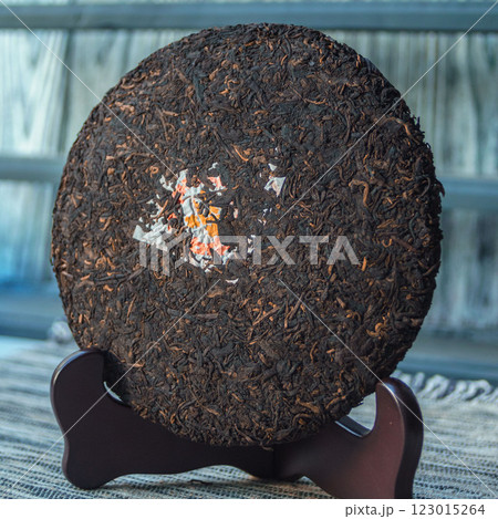 A Beautiful HighQuality Compressed Raw Tea Cake is Now Displayed for Your Enjoyment A Beautiful HighQuality Compressed Raw Tea Cake is Now Displayed for Your Enjoyment 123015264