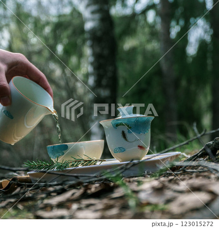Enjoy a Serene Tea Ceremony nestled within Nature, featuring an exquisite Beautiful Porcelain Set Enjoy a Serene Tea Ceremony nestled within Nature, featuring an exquisite Beautiful Porcelain Set 123015272